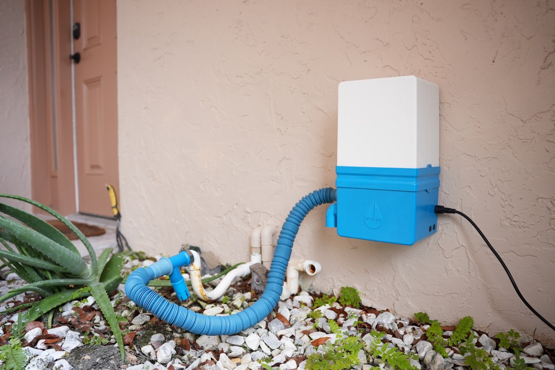 Final production Unclog installed on a residential condensate drain line