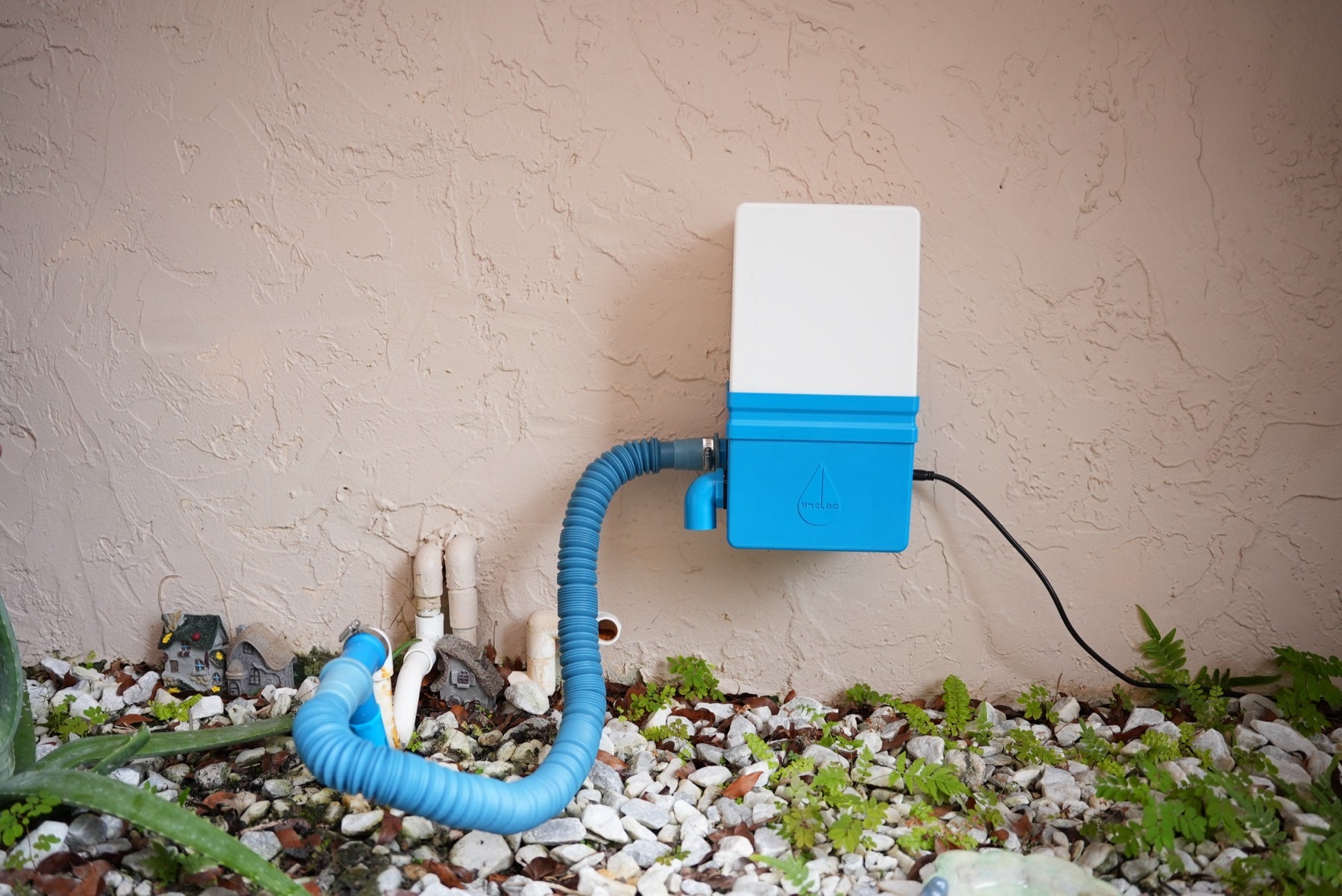Final production Unclog installed on a residential A/C condensate drain line